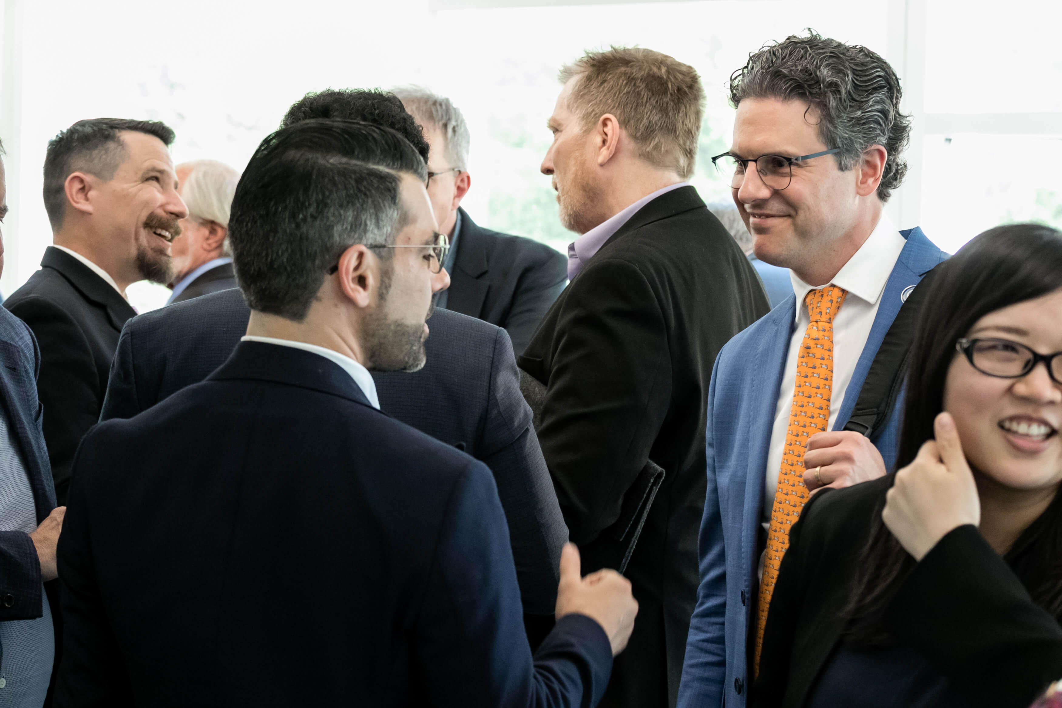 Aurelien Portuese speaks on stage with FTC commissioner, Mark Meador