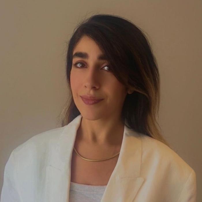 Headshot of Setareh Kermani wearing a white jacket