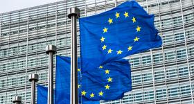 European Union flags in front of office building