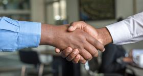 Two people shaking hands